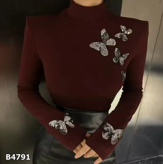 Blusa manga larga ocre con mariposas