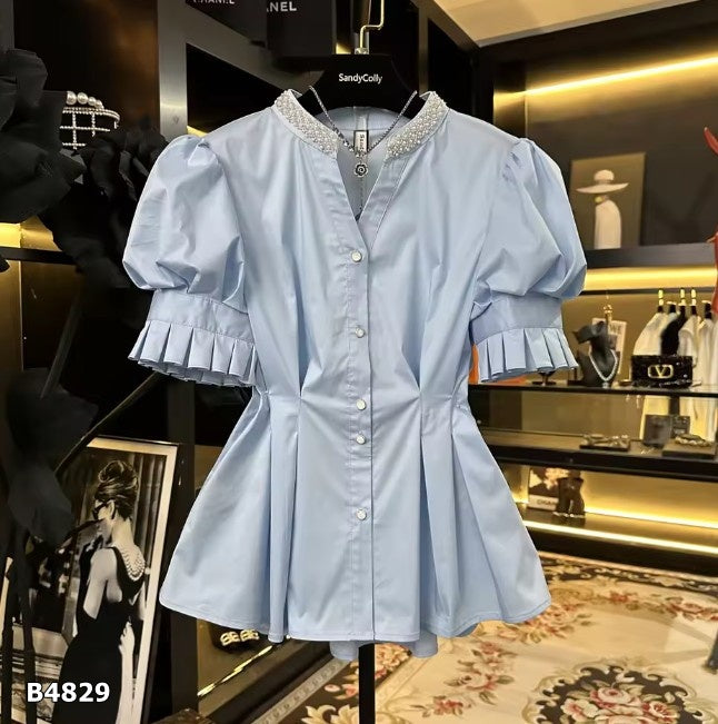 Blusa manga corta azul con pedrería