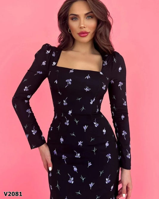 Vestido formal manga larga corte sirena negro floreado en seda