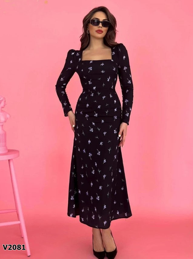 Vestido formal manga larga corte sirena negro floreado en seda