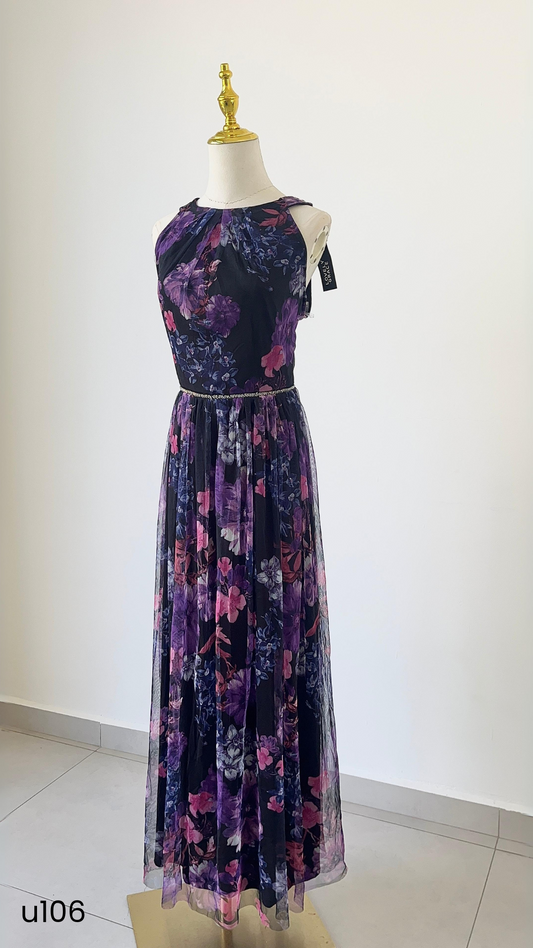 Vestido largo desmangado estampado en tonos purpura