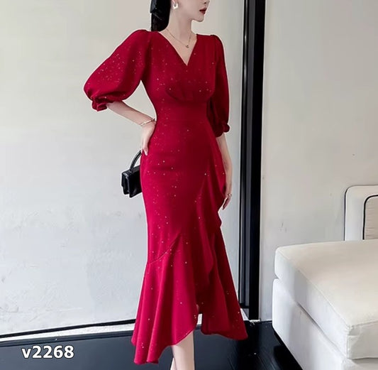 Vestido rojo corte sirena con brillos